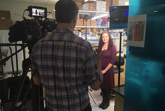 Microbiologist Deborah Fuller is interviewed by KOMO-TV.
