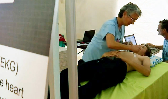 picture of high schooler being readied for an EKG at a Nick of Time Foundation event