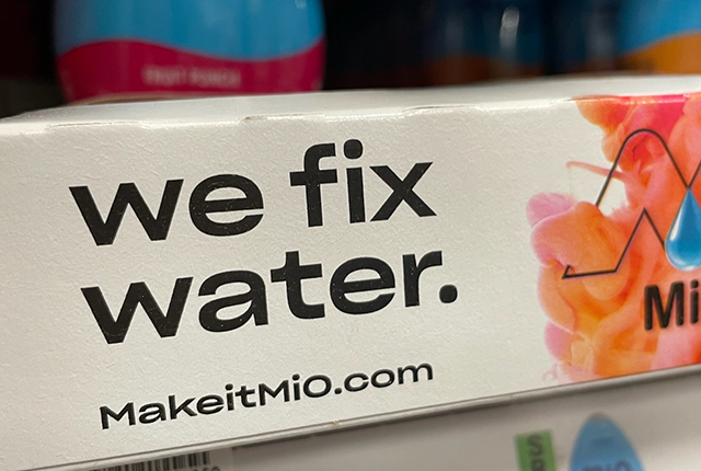 picture of product signage that says "We fix water"