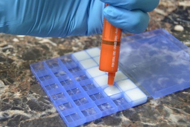 picture of ketamine lozenges being created by a pharmacist