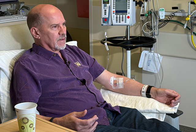 picture of patient Bob Pringle receiving a donanemab infusion at Harborview Medical Center