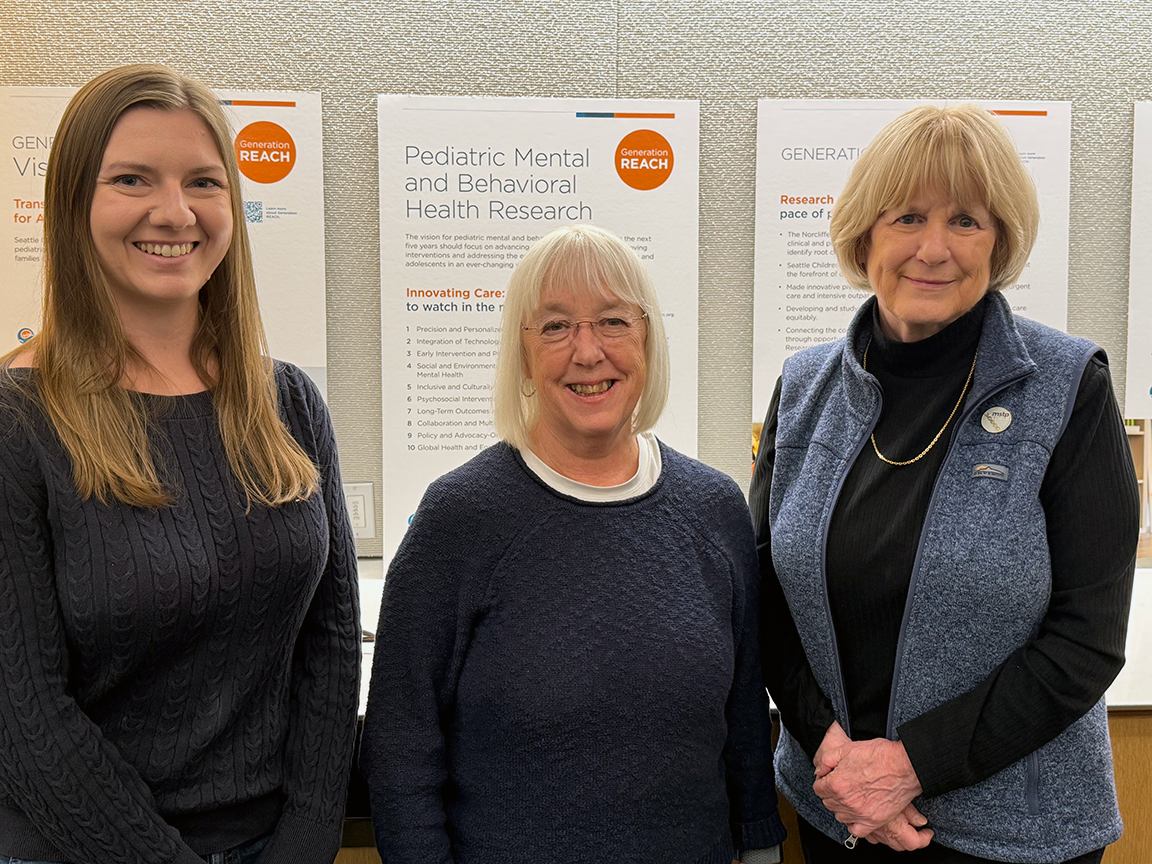picture of UW Medicine researchers Kristin Weinstein, left, and Mary-Claire King flanking U.S. Sen. Patty Murray