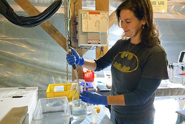 picture of scientist Brook Nunn testing ocean water samples