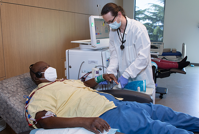 picture of man receiving care during a hemodialysis procedure