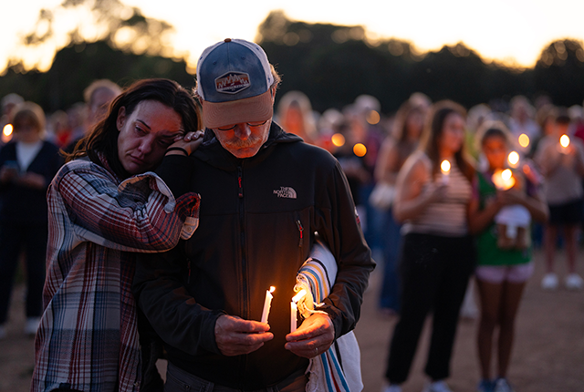 picture of people at a vigil for shooting victims in Minneapolis in August 2025