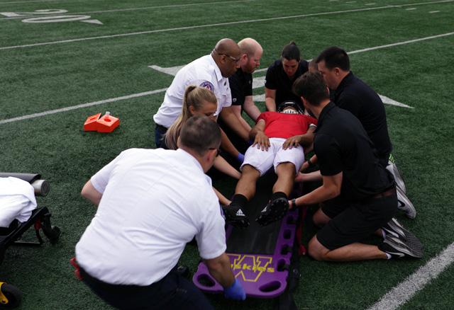 Media Name: football_injury_crop_transport_sports_medicine.jpg