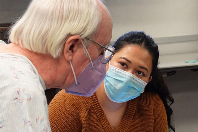 Media Name: medical_student_with_simulation_patient_reduced.jpg