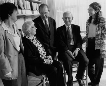 archival photo of George Stamatoyannopoulos and colleagues